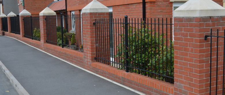 metal railings in brick work